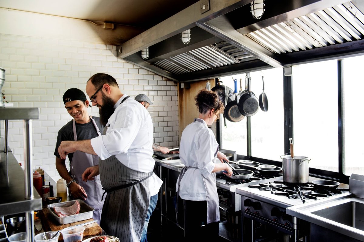 group-of-chefs-working-in-the-kitchen